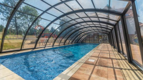 Apartamenty Sun & Snow Baltic Garden z basenem i placem zabaw